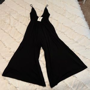 wasabi + mint black jumpsuit. Size S. Never worn, tags still on.